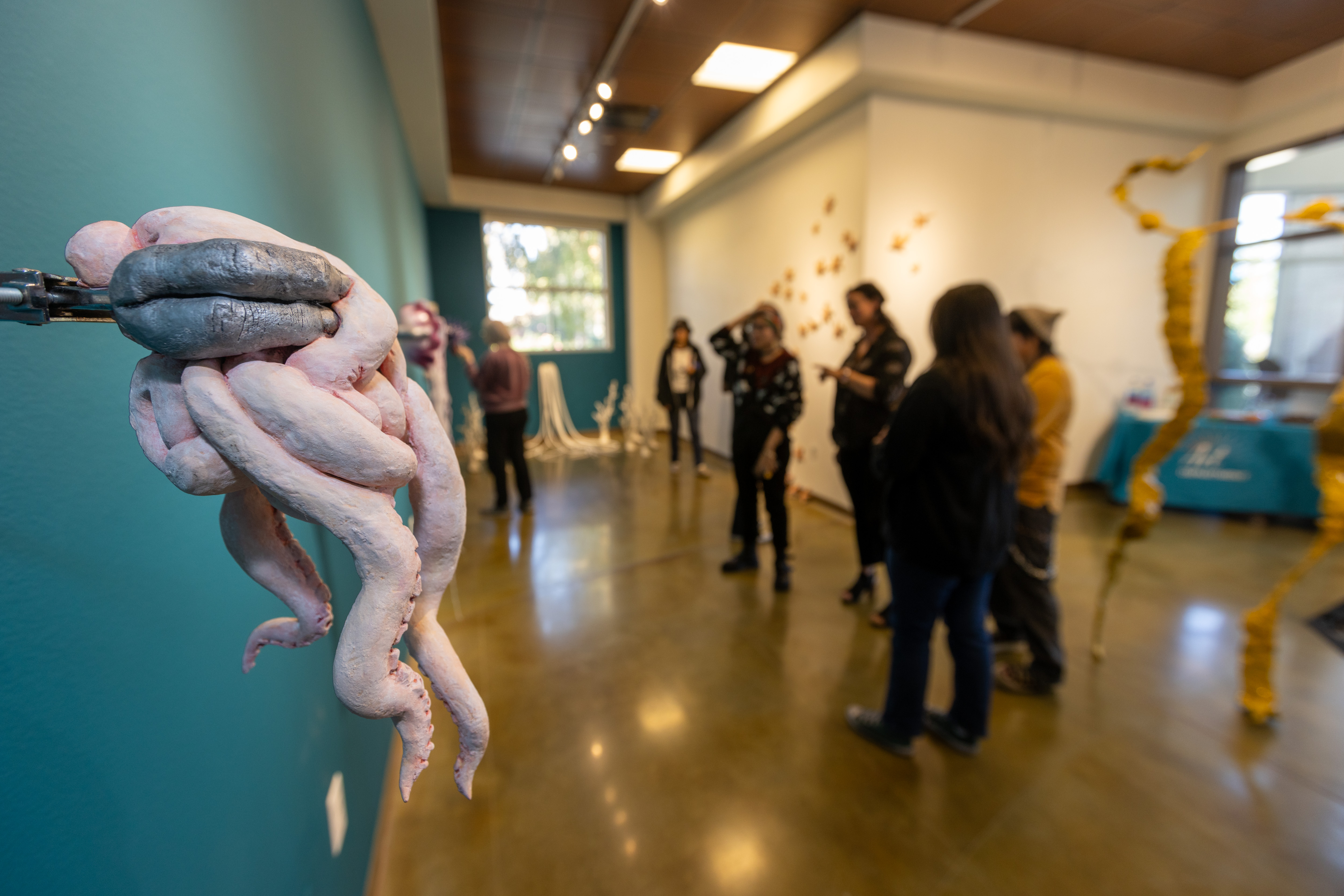 Attendees at art gallery exhibition