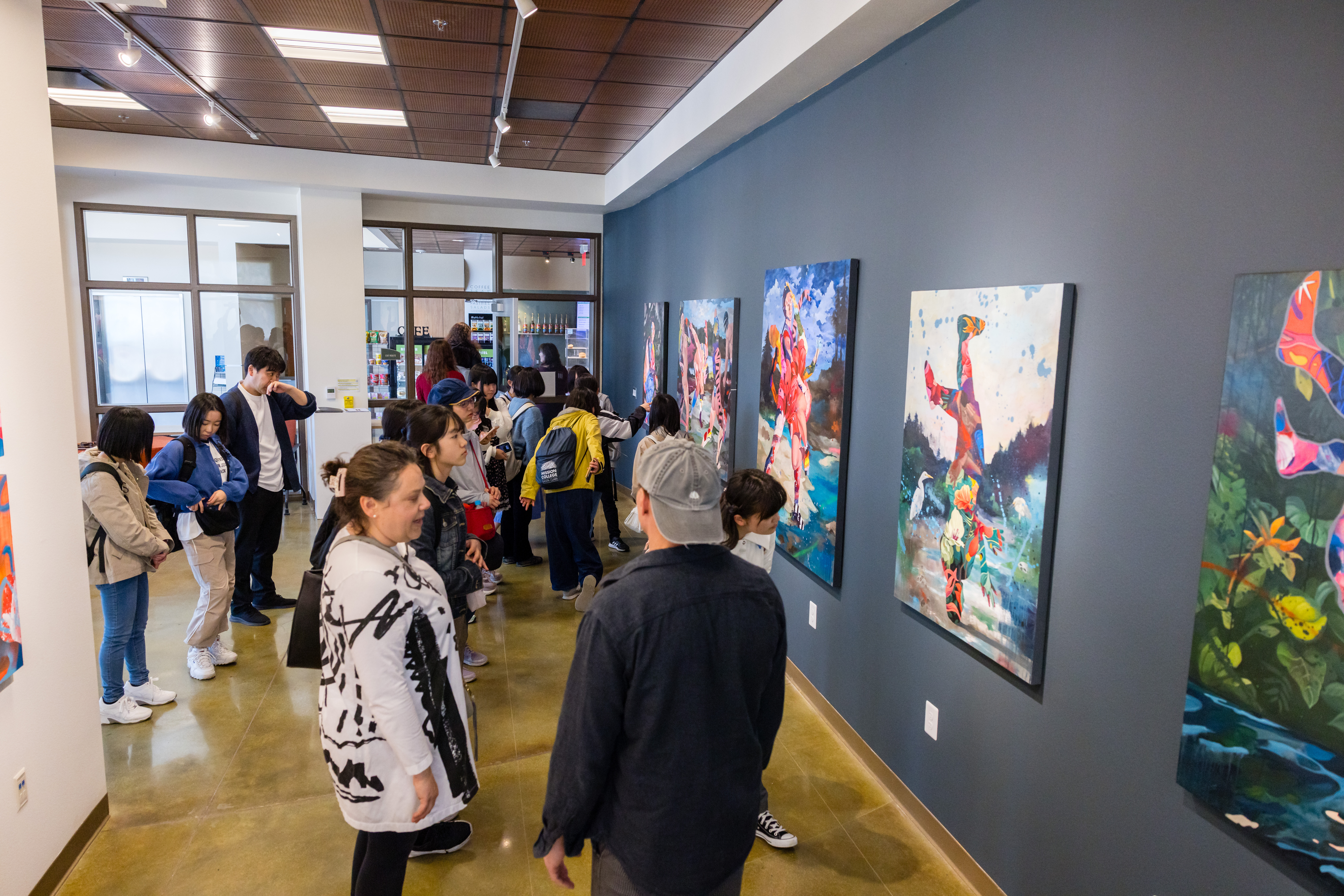 Attendees at art gallery exhibition