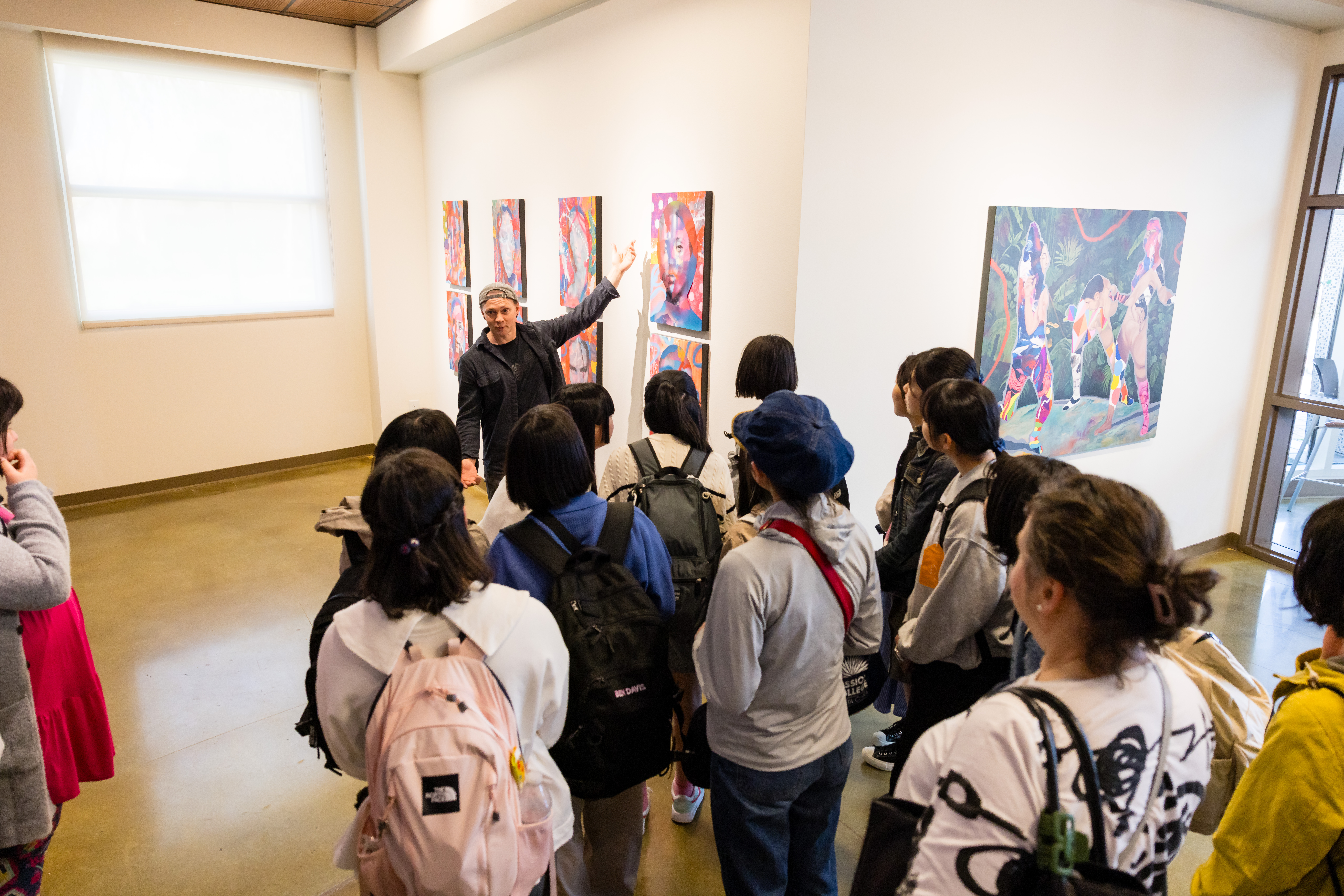 Attendees at art gallery exhibition