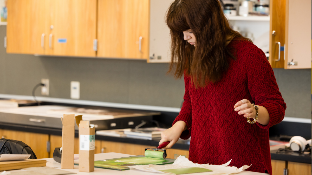 Art students working in classroom