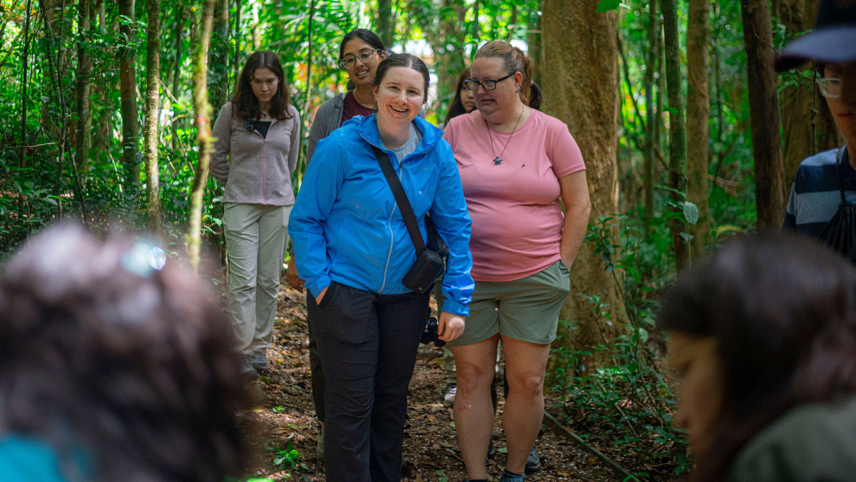 Students walking in woods