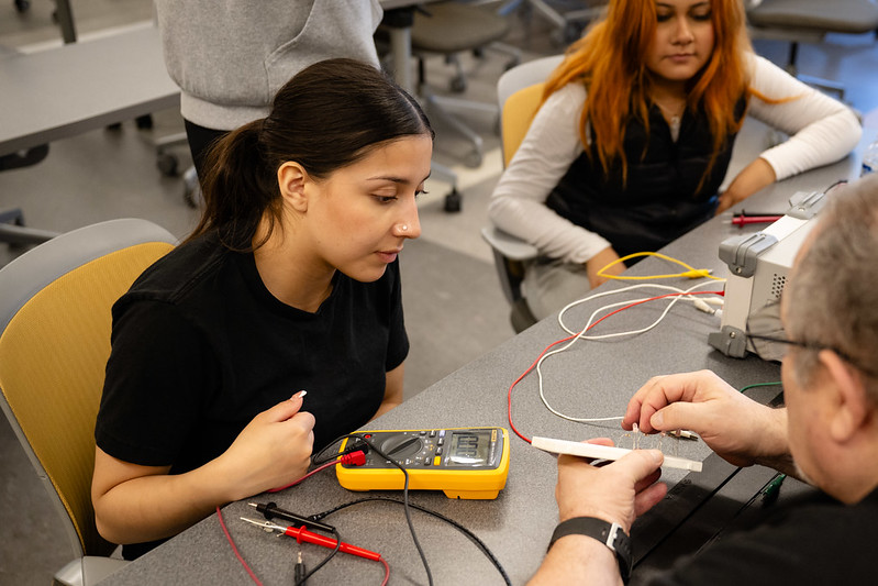 Students testing multimeter
