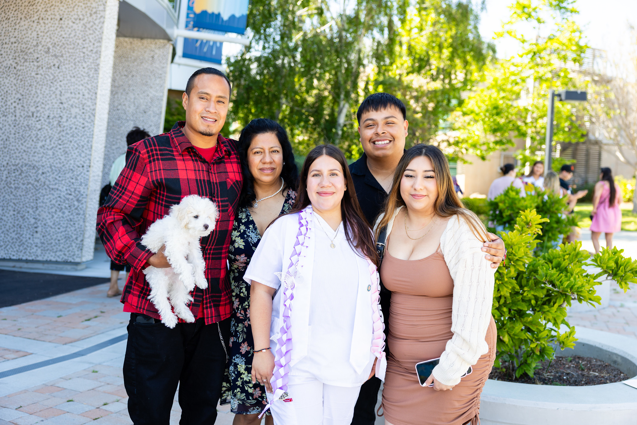 Certified Nursing Assistant graduate with family