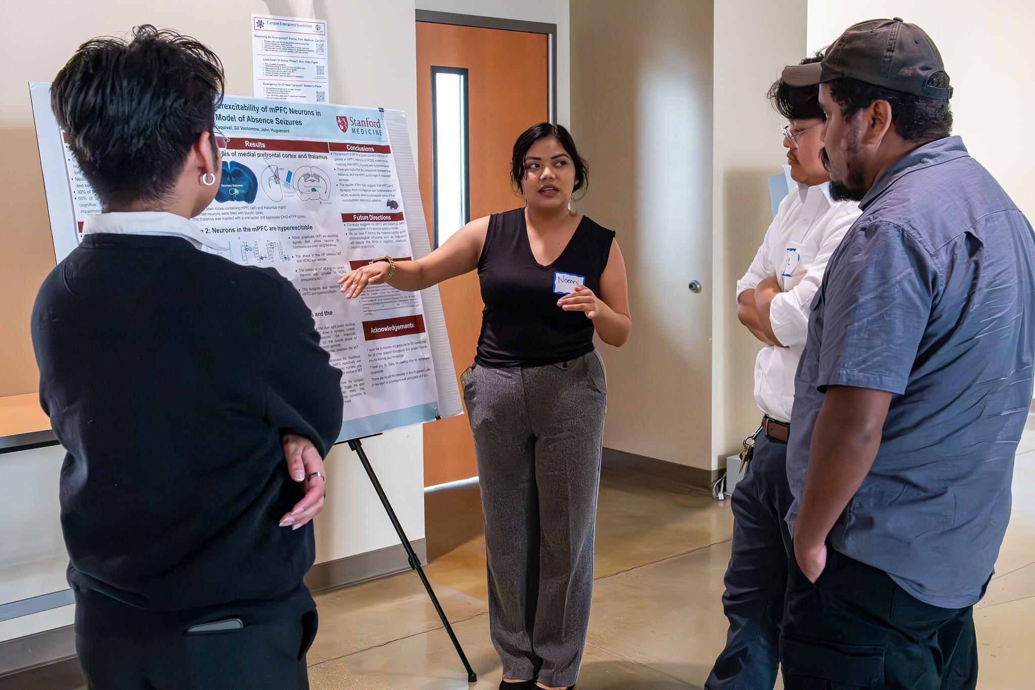Female student discussing her presentation