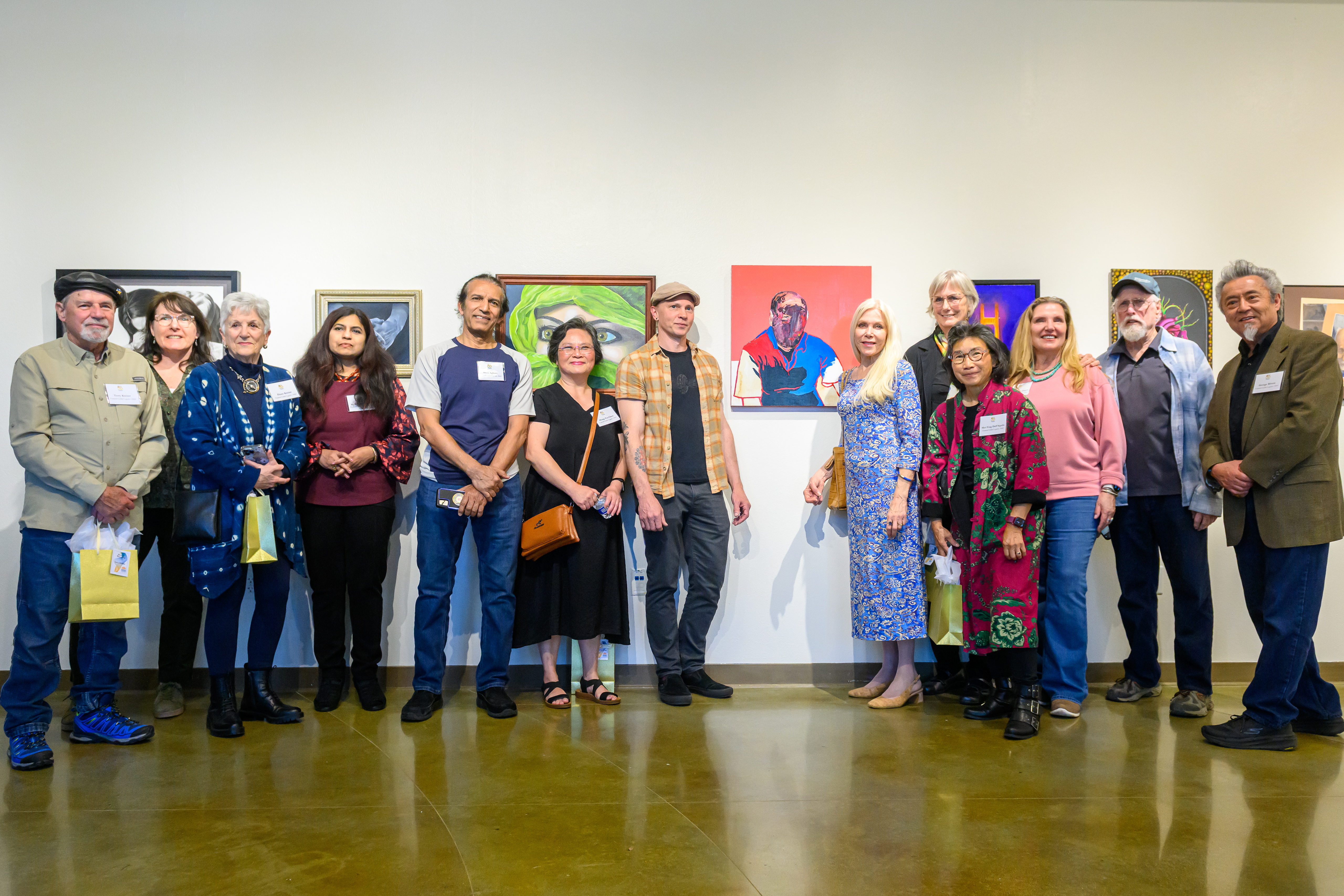 People in front of art