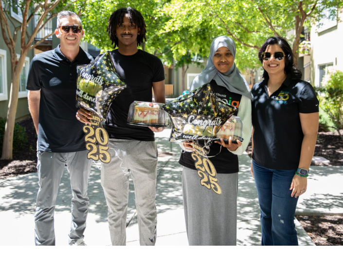 Dr. Awan talking to students