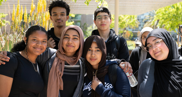 Students smiling on-campus