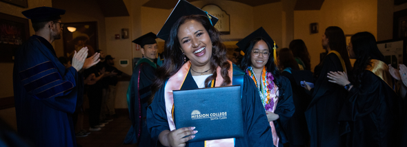 Smiling student graduating
