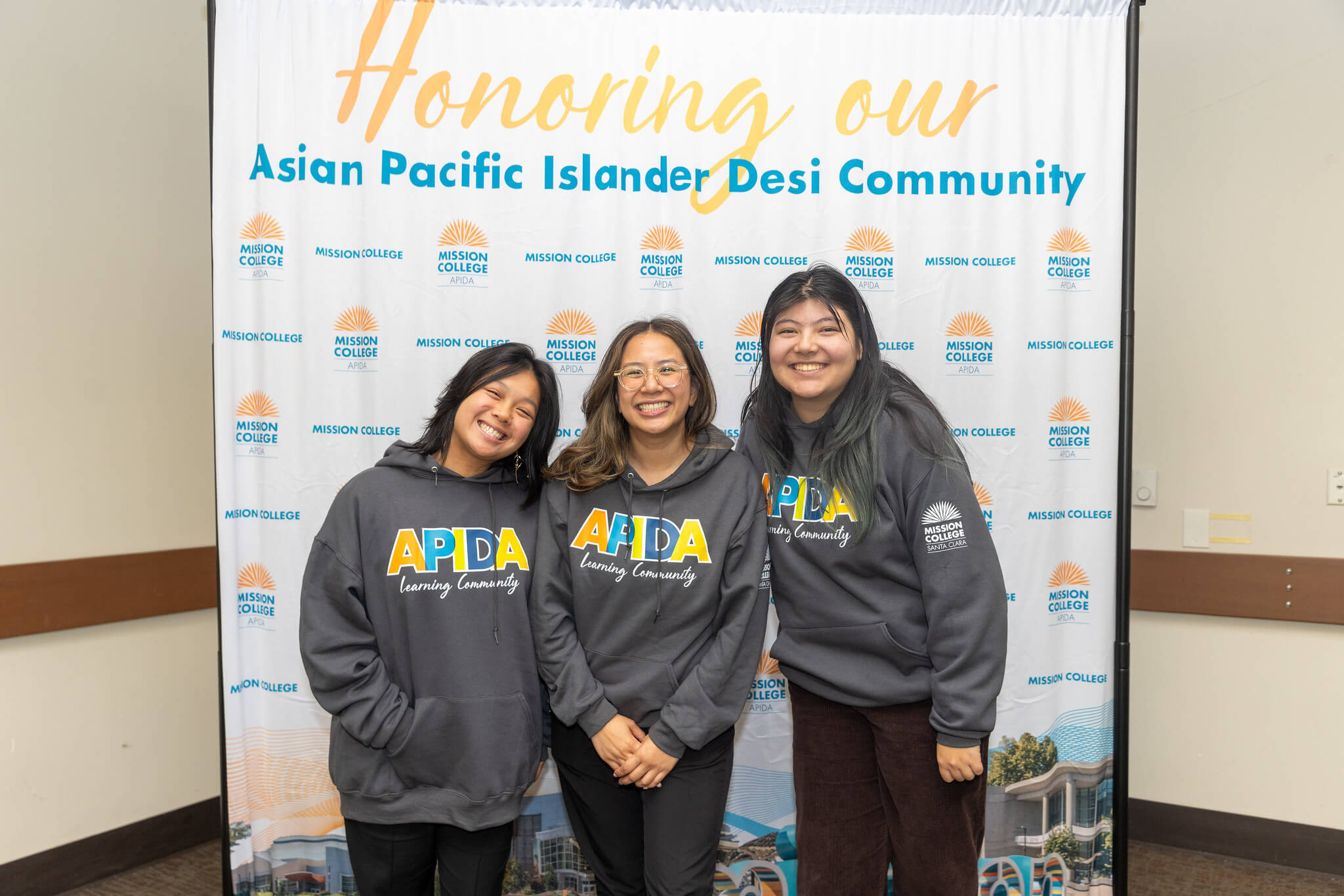 Female APIDA members posing for a picture