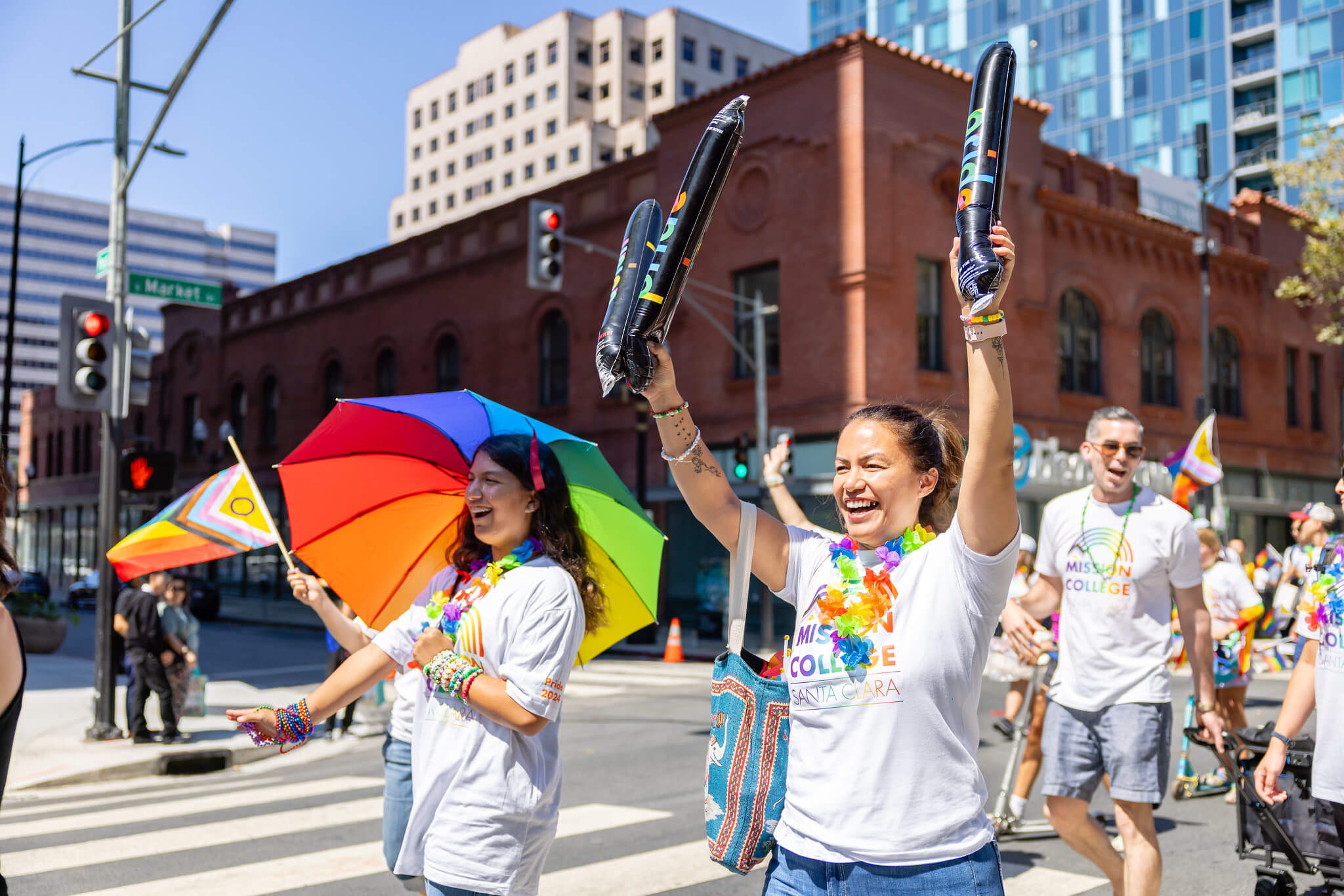 People participating in LGBTQIA+ parade