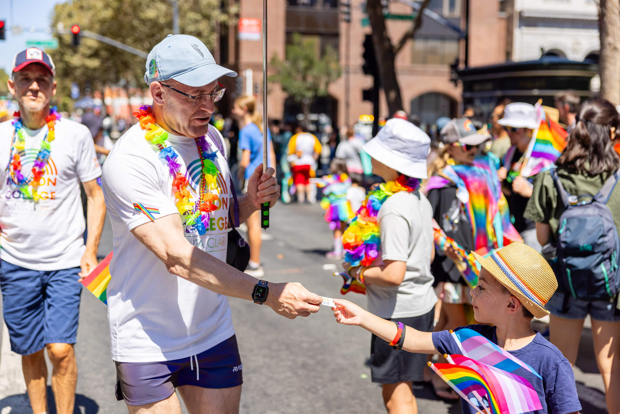 People participating in LGBTQIA+ parade