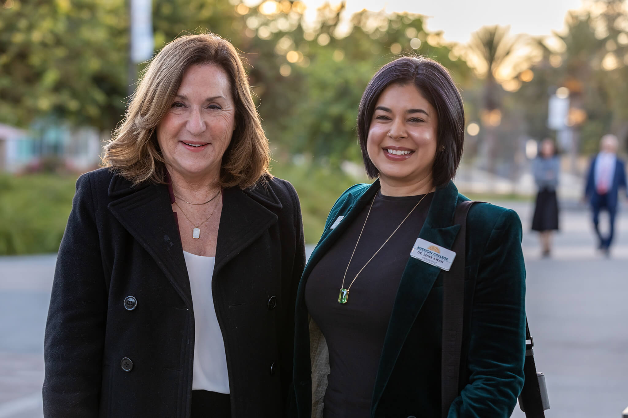 Seher Awan and another woman posing for picture outside