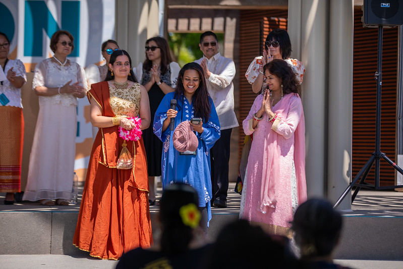 People speaking on stage