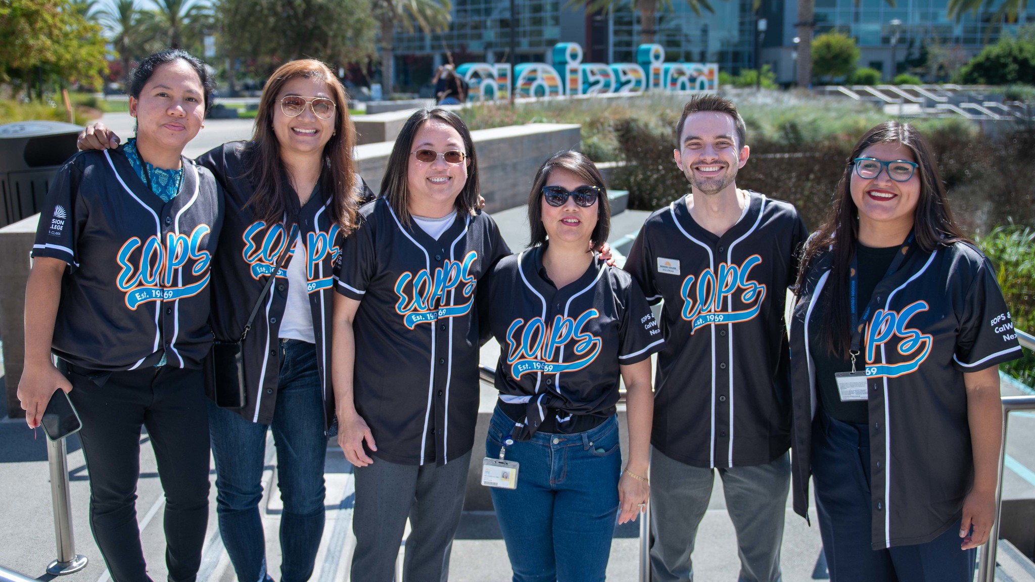 Members of EOPS posing for picture outside