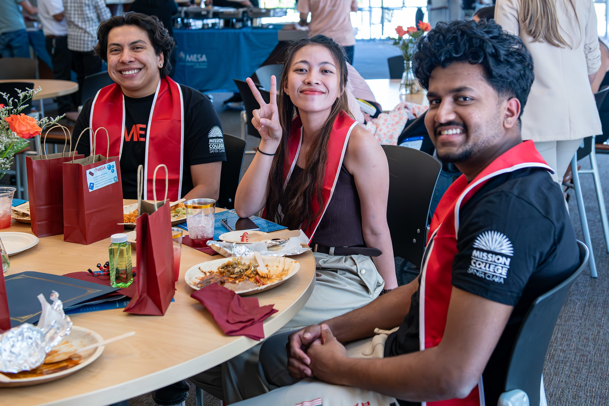 Students posing for picture at Mesa anniversary event