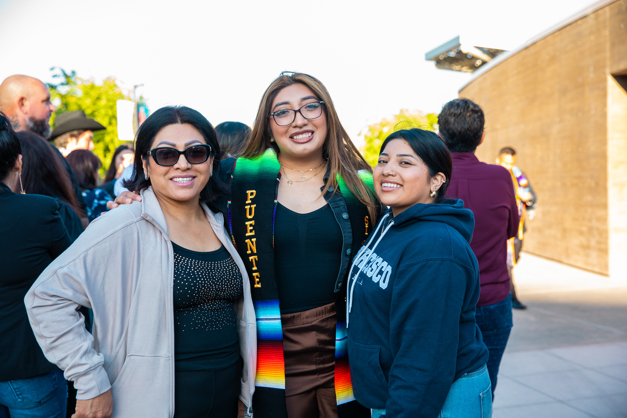 Mission College Puente member graduate with family