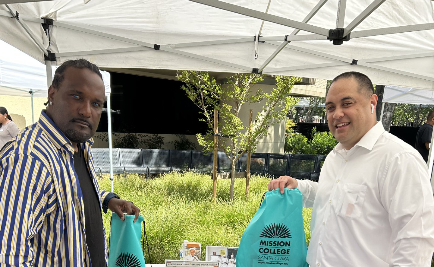 Two people posing for a picture