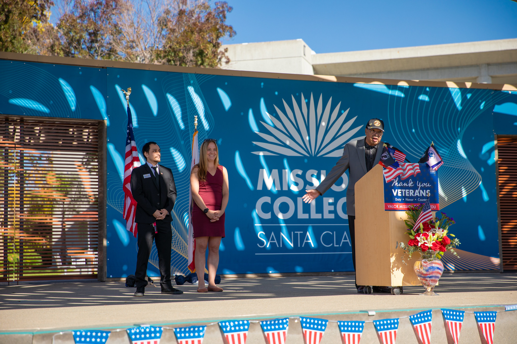 Veteran speaking at podium