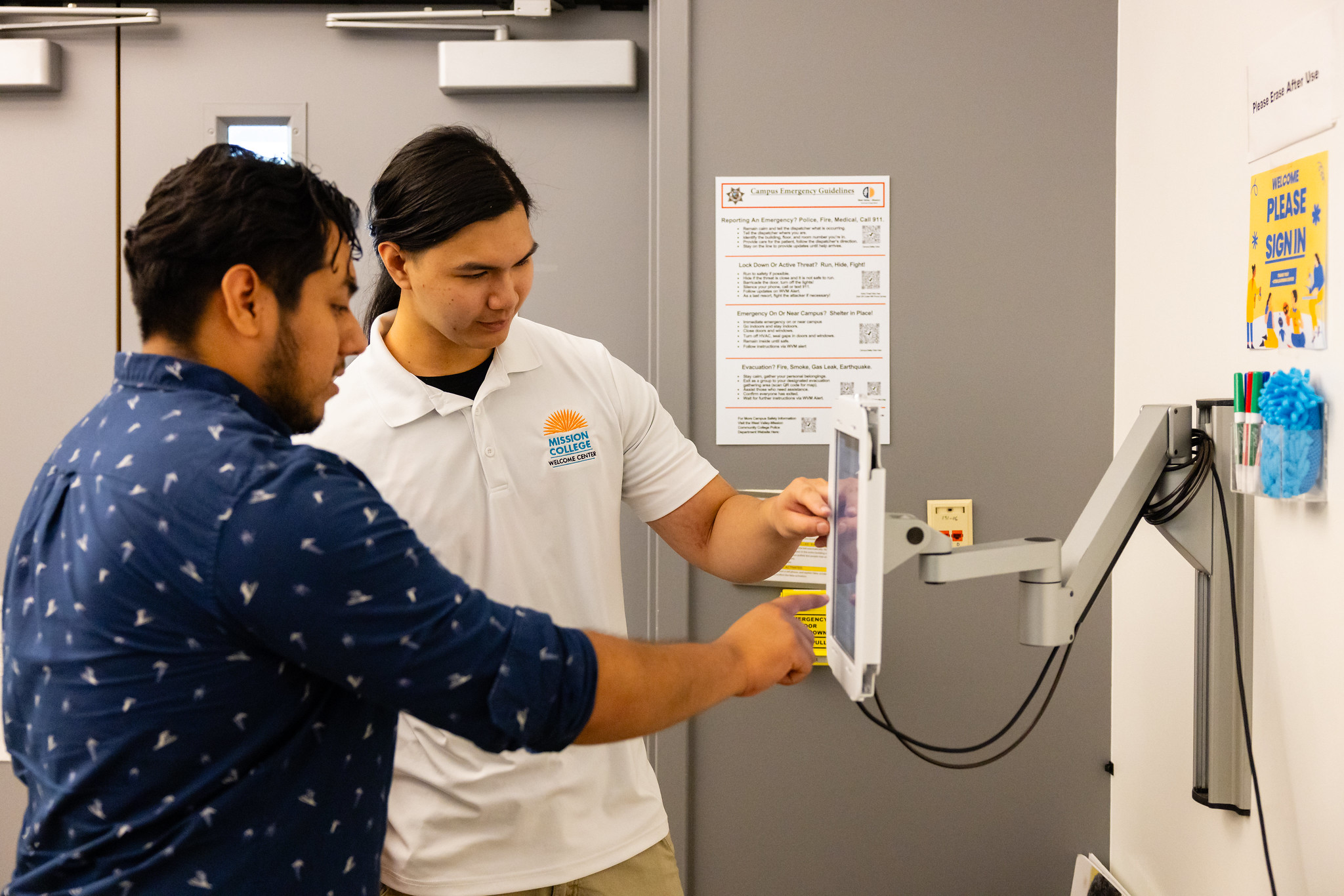 Welcome ambassador helping student