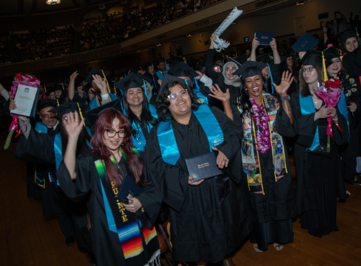 Smiling students at graduation