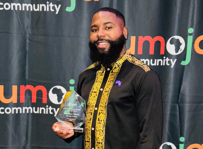 Smiling employee at award cermeony